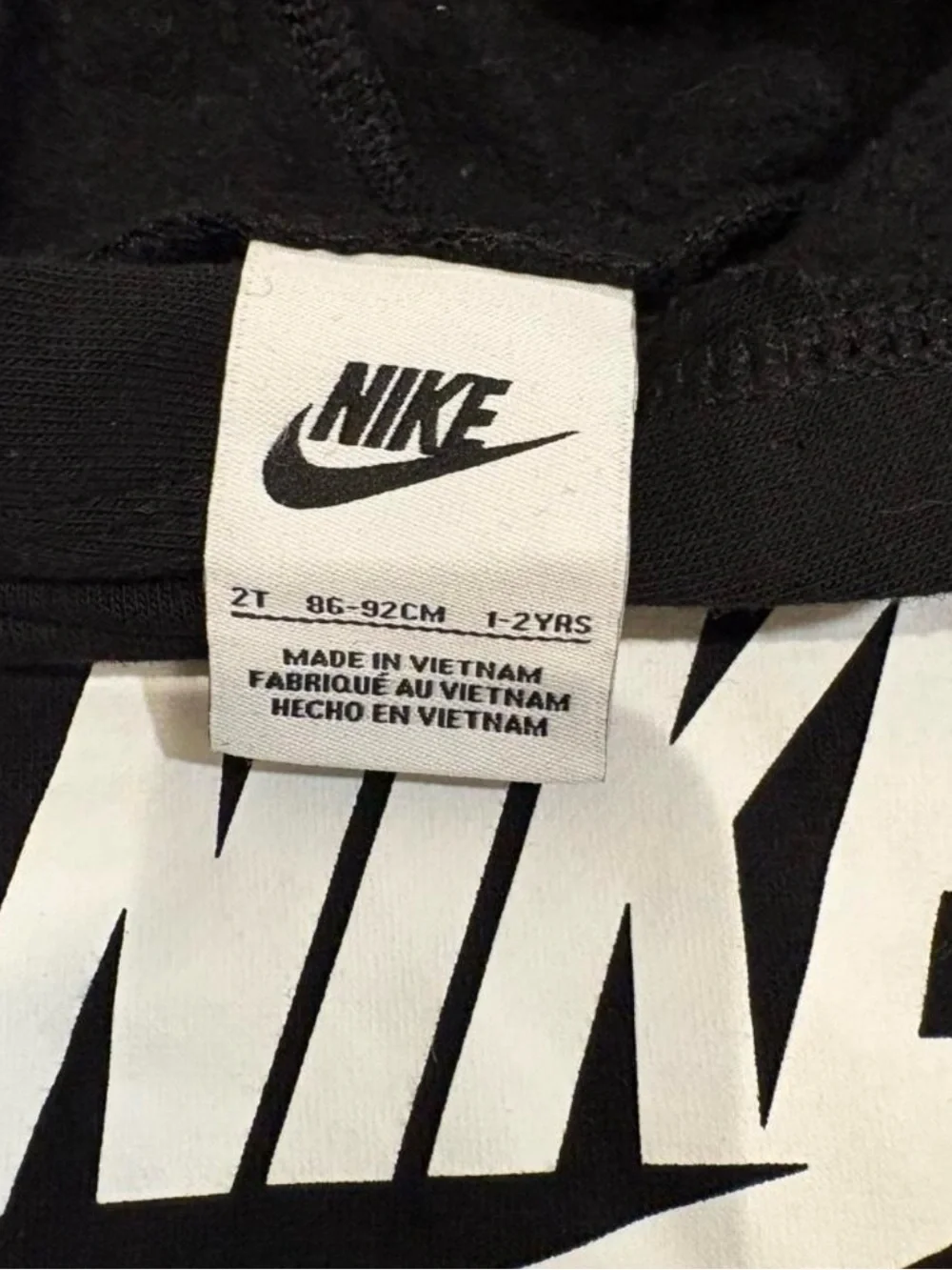 Nike Black Hoodie with White Swoosh Logo - Kids